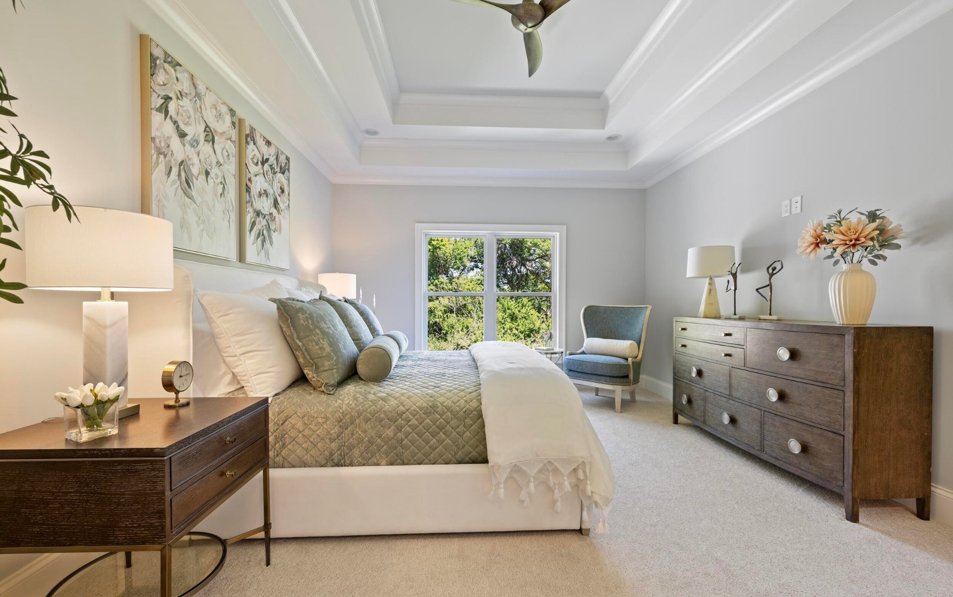 Primary bedroom with tray ceiling