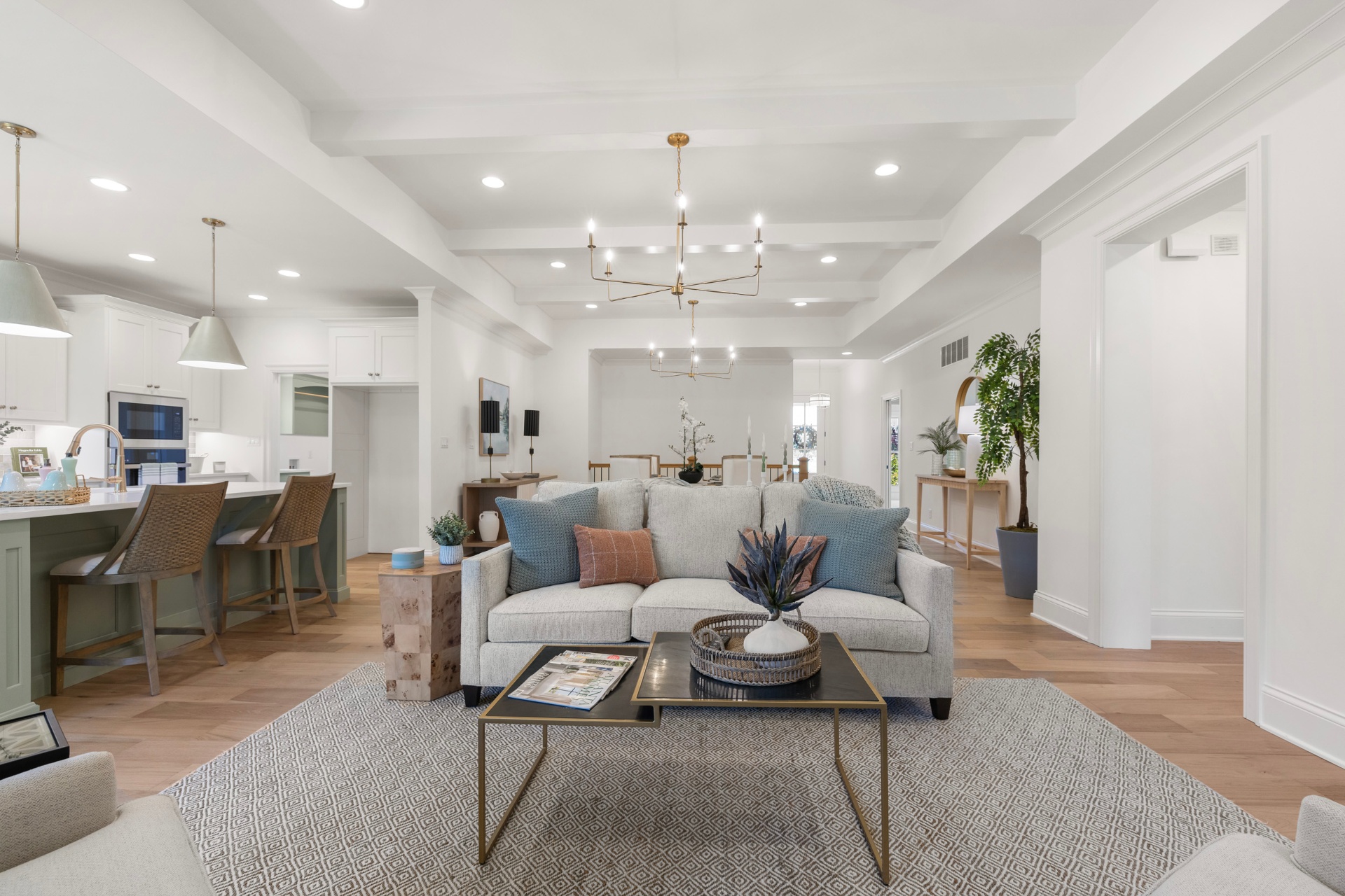 Open-concept living room with coffered ceiling